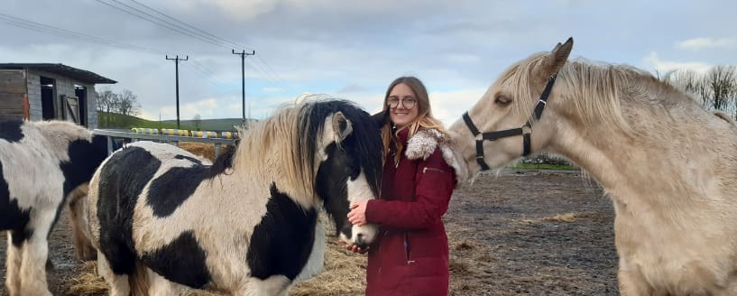 Kelsey with two horses